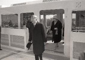 Their Majesties the Emperor and Empress ride the monorail at the Osaka Expo